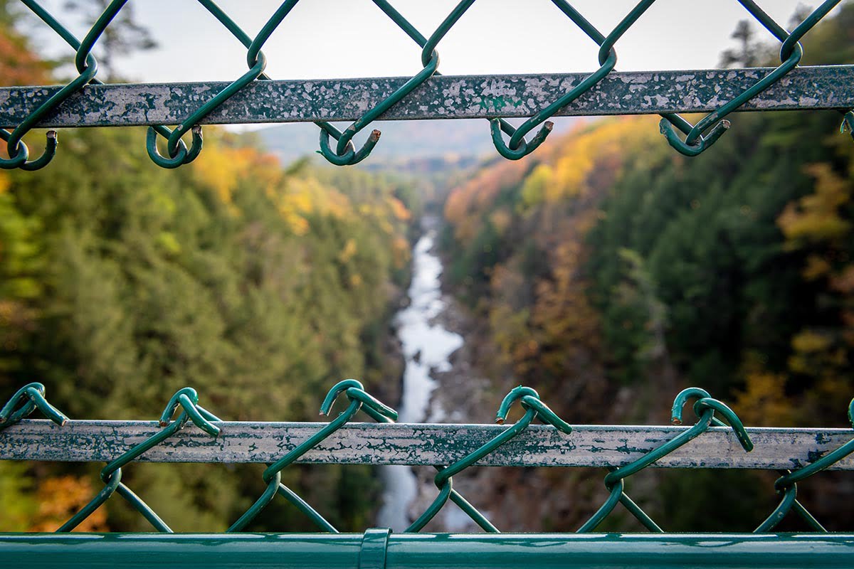 Quechee Gorge through a fence in Quechee, Vermont