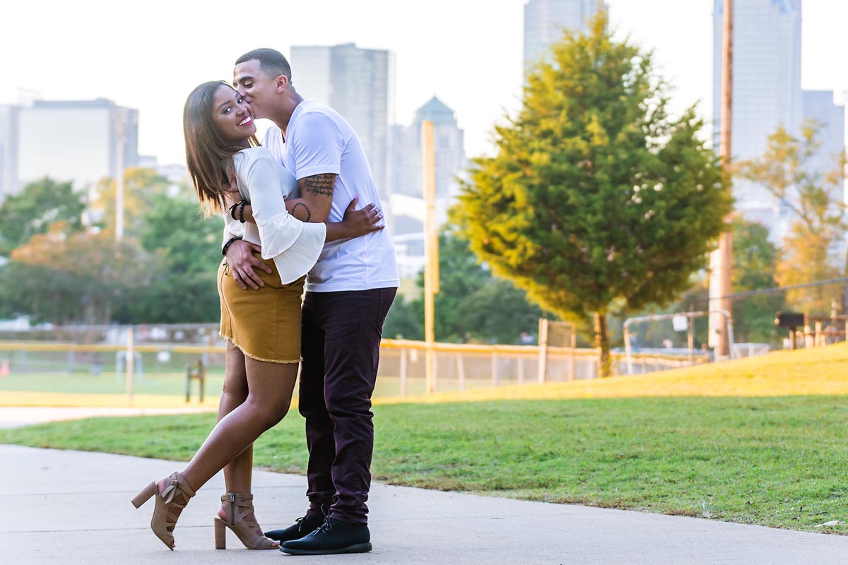 A couple celebrates in Independence Park in Charlotte, NC.